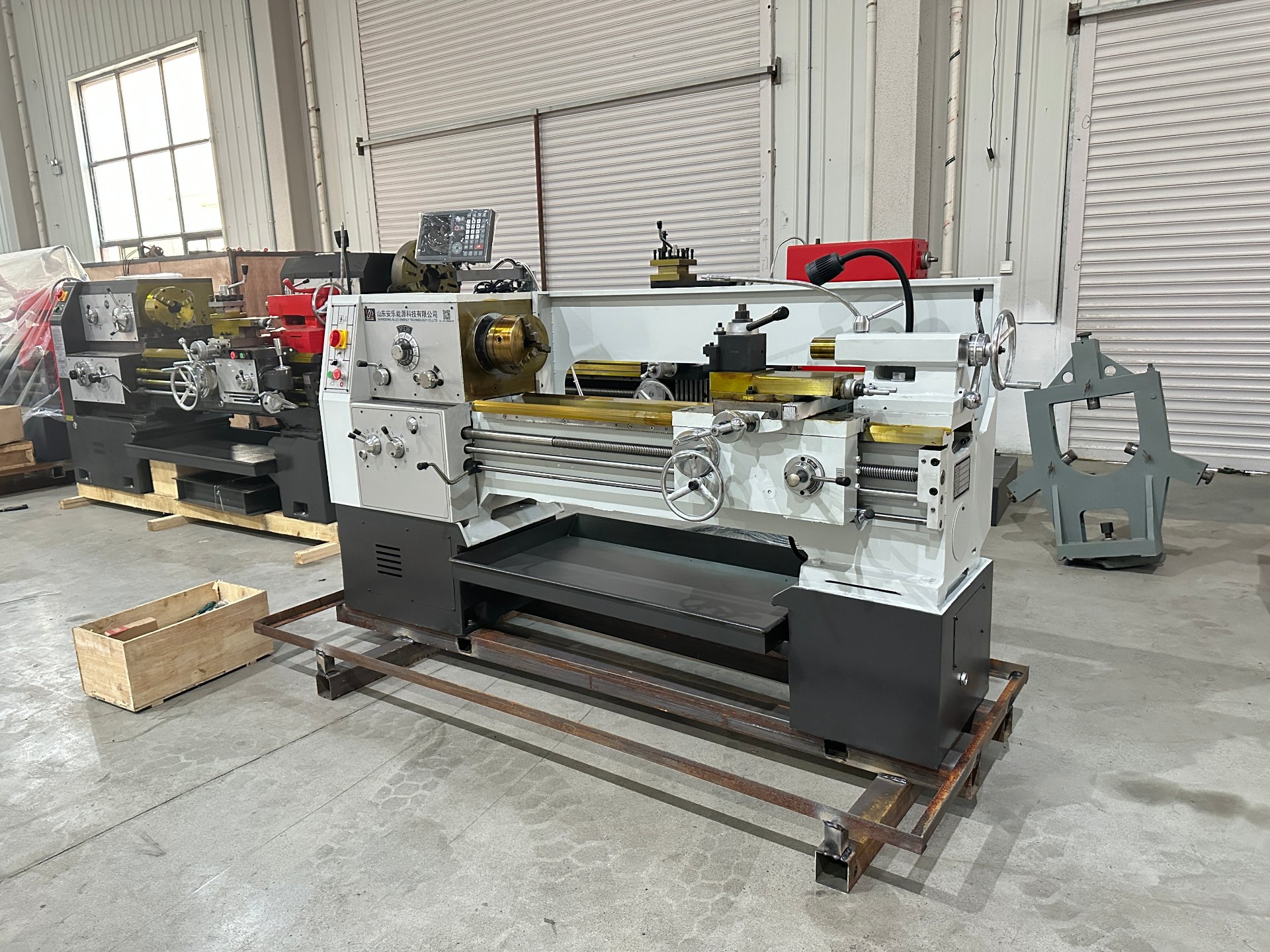 Front view of the ALCA6136 manual lathe before shipment